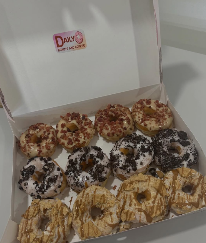 A dozen DailyO specialty donuts in the box